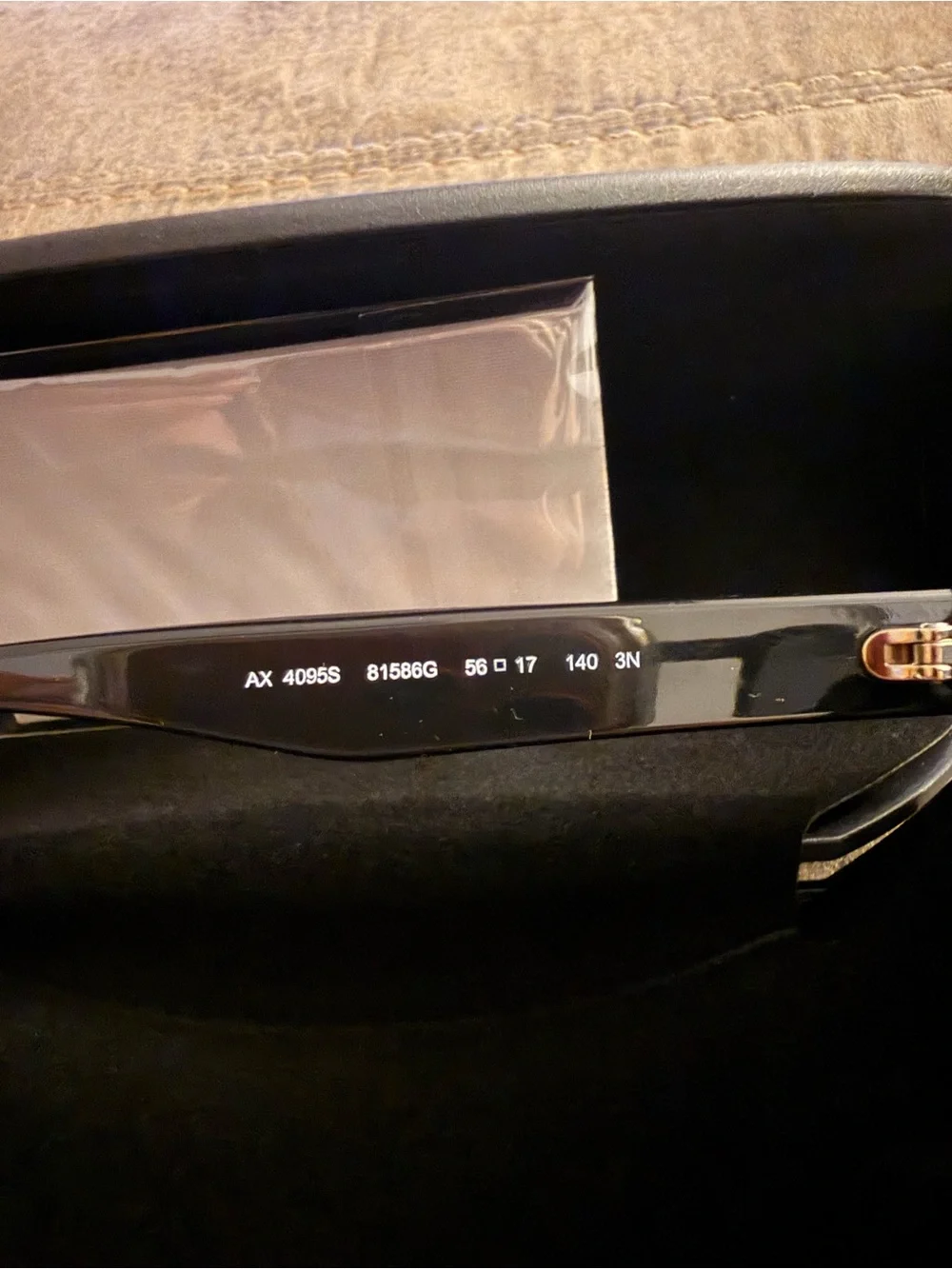 Armani Exchange Black Cat-Eye Sunglasses with Red Logo Accent